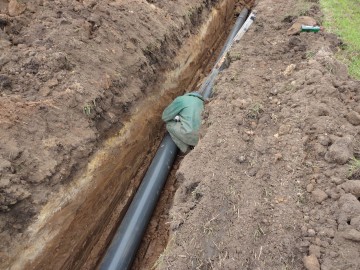 Laying 250mm PVC pipe 1